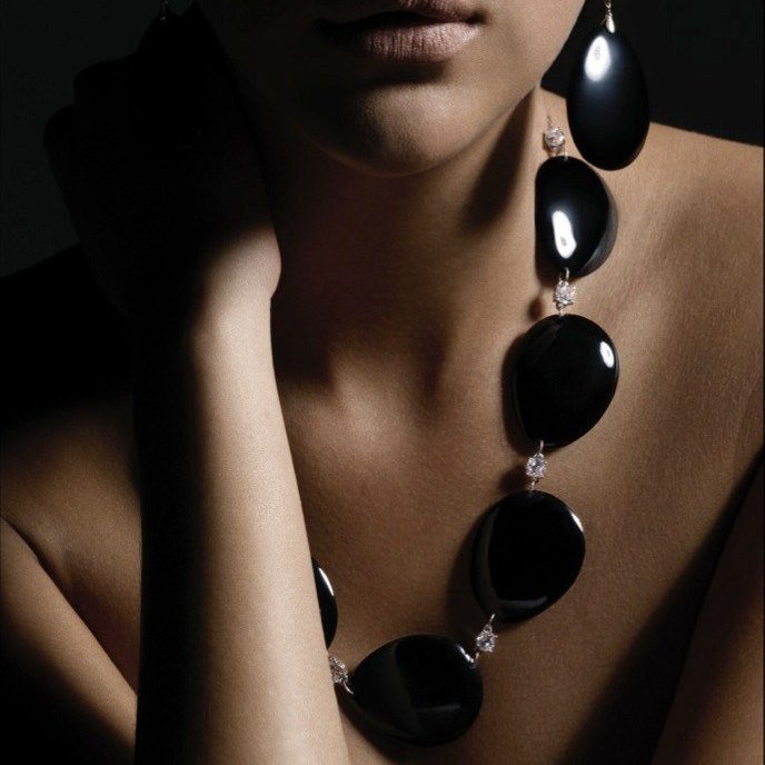 Emporio Armani jewelry campaign: black stone necklace and earrings